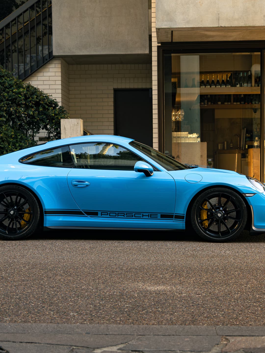 Mexico blue Porsche 911 R photographed side-on in a Brisbane street